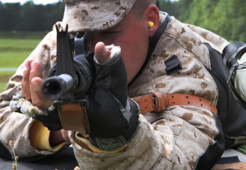Cpl. Jared Litke, a member of the Marine Corps Shooting Team, gets ready to load a second magazine into his M16 national match rifle during a rapid fire session at the rifle range aboard Marine Corps Base Quantico, Va., July 14, 2010. The Marine Corps Shooting Team is made up of some of the Corps best shots and competes nationwide, as well as establishing a cadre of experienced marksmen to pass knowledge to the next generation of devil dogs.