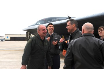 WHITEMAN AIR FORCE BASE, Mo. - Brig. Gen. Garrett Harencak (left), 509th Bomb Wing commander, is met by several members of wing leadership following his end-of-tour B-2 flight March 9. General Harencak will pass command of the 509th Bomb Wing to Col. Robert Wheeler, 2d Bomb Wing commander Barksdale AFB, La., during a change-of-command ceremony March 26. (U.S. Air Force photo/Staff Sgt. Charles Larkin)