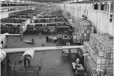lossy-page1-743px-Looking_up_one_of_the_assembly_lines_at_Ford's_big_Willow_Run_plant,_where_B-24E_(Liberator)_bombers_are_being_made..._-_NARA_-_196389.tif