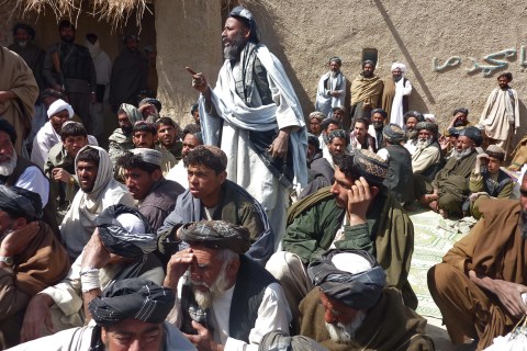 Afghan men gather for a service ceremony