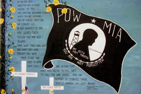 A poster honoring Matt Maupin hangs on the wall during a reception for the U.S. Army Reserve's 724th Transportation Company February 25, 2005 near Fort McCoy in Tomah, Wisconsin. 