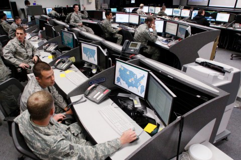 Personnel work at the Air Force Space Command Network Operations & Security Center at Peterson Air Force Base in Colorado Springs