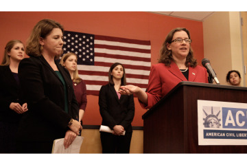 ACLU Women's Rights Project senior staff attorney Ariela Migdal, right, gestures while speaking beside ACLU attorney Elizabeth Gill, left, during a media conference Tuesday, Nov. 27, 2012, in San Francisco.