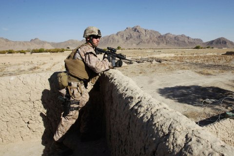 image: A U.S. Marine observes an area while on guard at a police sub-station at Now Zad district in Helmand province, Afghanistan, Nov. 8, 2012.  