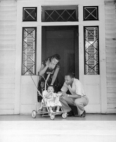 Civil rights leader Reverend Martin Luther King, Jr. relaxes at home with his family in May 1956 in Montgomery, Ala.