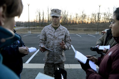 Marine Corps First Lieutenant Agustin Solivan briefs members of the news media at the National Museum of the Marine Corps, near the Marine Corps Base Quantico in Quantico, Virginia on March 22, 2013. 