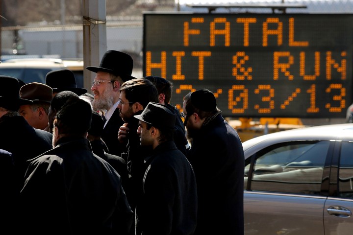 Members of the Brooklyn Orthodox Jewish community attend a news conference to discuss the recent deaths of an Orthodox couple and their unborn child in a hit and run crash in the Brooklyn borough on March 4, 2013 in New York City.