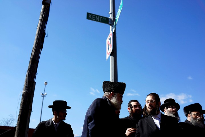 Members of the Brooklyn Orthodox Jewish community attend a news conference to discuss the recent deaths of an Orthodox couple and their unborn child in a hit and run crash in the Brooklyn borough on March 4, 2013 in New York City. 
