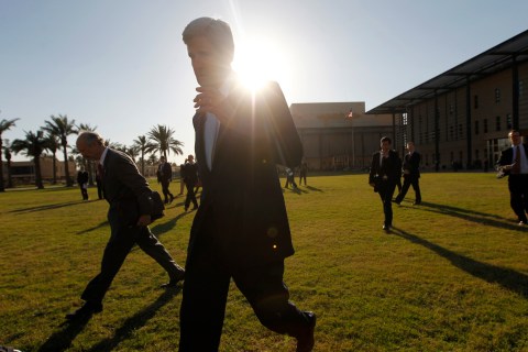 U.S. Secretary of State John Kerry walks to his helicopter on the grounds of the U.S. Embassy in Baghdad