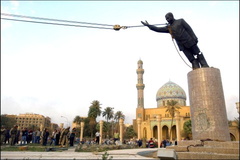 04/09/2003. Operation Iraqi Freedom - Day 21: US Troops enter central Baghdad and topple statue of Saddam Hussein