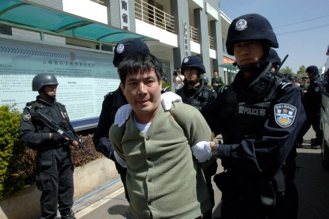 Principal suspect Naw Kham leaves the detention centre for execution in Kunming