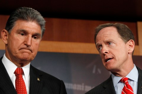 Senator Toomey and Senator Manchin hold news conference on firearms background checks on Capitol Hill in Washington