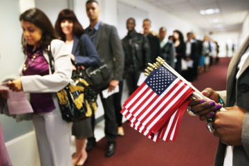 Immigrants Sworn In As US Citizens At Naturalization Ceremony