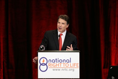 Governor Rick Perry addresses a large audience in attendance at the National Right To Life Convention, Thursday, June 27, 2013, in Grapevine, Texas.