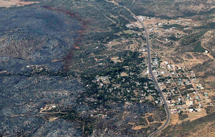An aerial view of a strip of fire retardant near Yarnell, Arizona