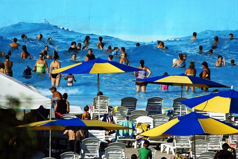 Swimmers beat the heat by cooling off in the wave pool at the Montage Mountain Water Park in Scranton, Pa., on July 17, 2013.