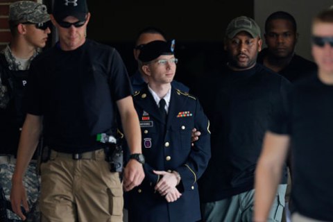 Bradley Manning is escorted out of a courthouse in Fort Meade, Md., on  July 30, 2013.
