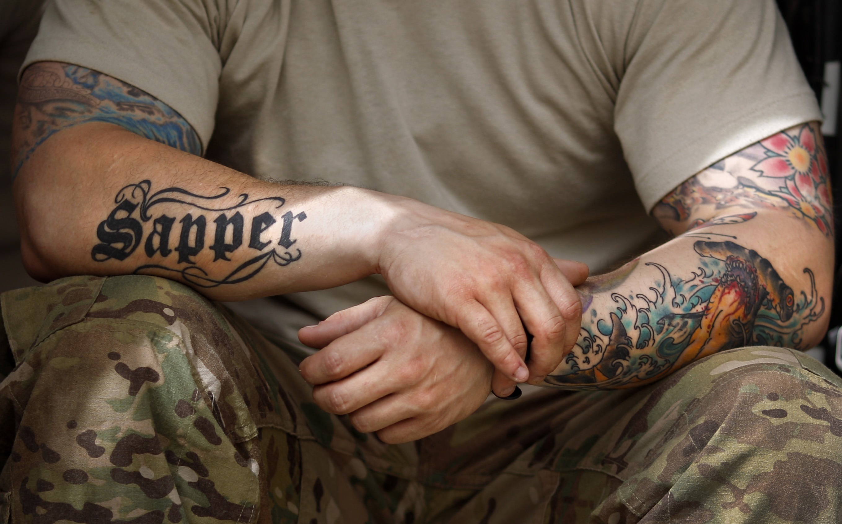 Army relaxes tattoo policy approves some hand neck ink as it faces  recruiting shortfall  Stars and Stripes