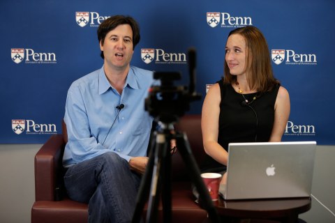 University of Pennsylvania professor Peter Struck, accompanied by teaching assistant Cat Gillespie, teaches a mythology class during a live recording of a massive, open, online classes (MOOC), in Philadelphia, May 30, 2013. 
