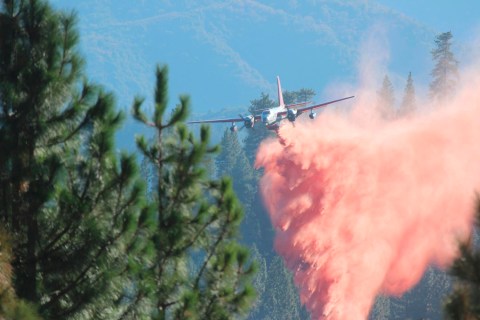 U.S. Forest Service handout photo shows a tanker dropping retardant on the Rim Fire near Yosemite National Park in California