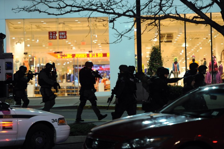 Police respond to reports of a gunman inside Westfield Garden State Plaza mall in Paramus, N.J. on Monday, Nov. 4, 2013.