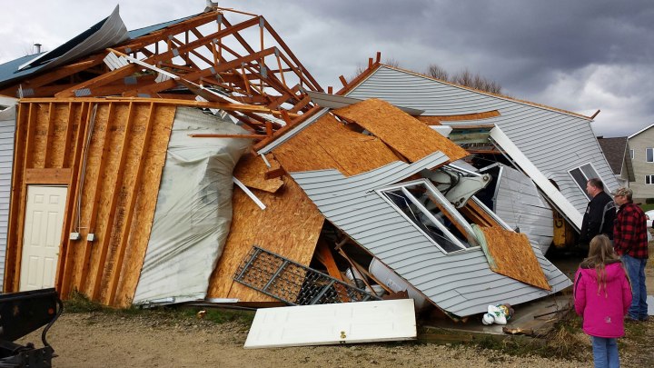 A garage in Hustisford, Ill. collapsed and walls were turned inside-out after severe weather moved through the area on Nov. 17, 2013. 