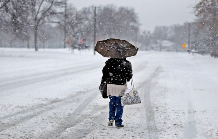 Olivia Kumi braved the wintry weather by walking to work, on Dec. 4, 2013 in Brooklyn Park, Minn.