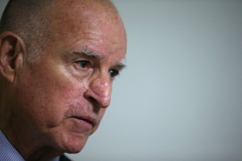 California Gov. Jerry Brown speaks to reporters after filing paperwork for re-election at the Alameda County Registrar of Voters on Feb. 28, 2014 in Oakland, Calif.